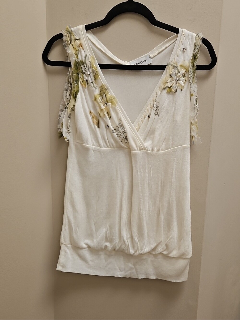CarlOPik Sleeveless White V-Neck Tank with Olive Floral Appliqué